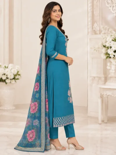 The outfit is teal blue peacock blue. 1