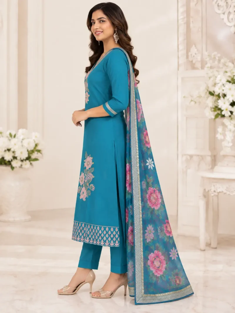 The outfit is teal blue peacock blue. 1